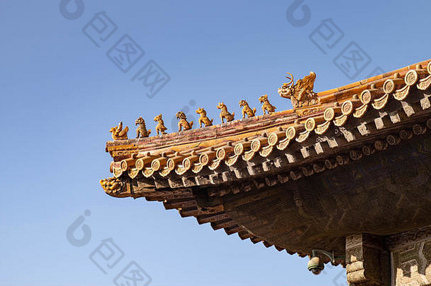 北京中国1月不朽的野兽屋檐建筑被禁止的城市黄色的屋顶蓝色的天空