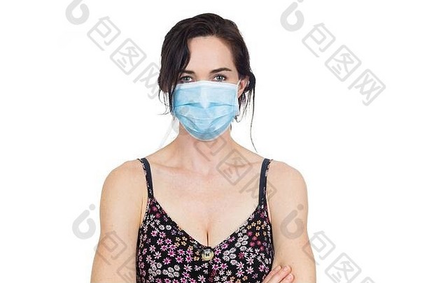 女人穿保护脸面具保护病毒感染孤立的白色