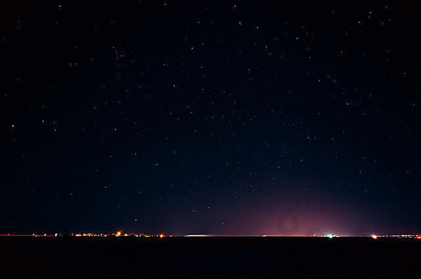 自然真正的晚上天空星星背景纹理布满星星的天空城市