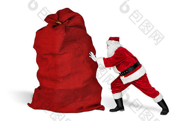 经典传统的疯狂的有趣的圣诞老人老人精疲力尽交付服务推巨大的巨大的大红色的袋圣诞节礼物现在孤立的