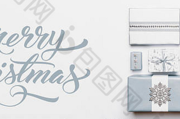 圣诞节礼物横幅美丽的北欧圣诞节礼物孤立的白色背景柔和的蓝色的<strong>彩色</strong>的包装圣诞节盒子礼物包装凹陷