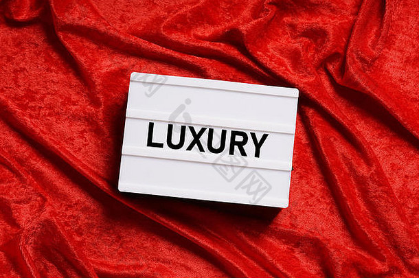 奢侈品文本lightbox光盒子标志红色的天鹅绒背景