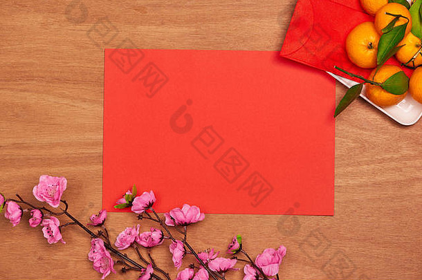 前视图配件中国人一年节日装饰橙色叶木篮子红色的包李子开花红色的背景