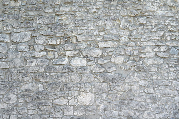 石头墙使灰色的自然石头