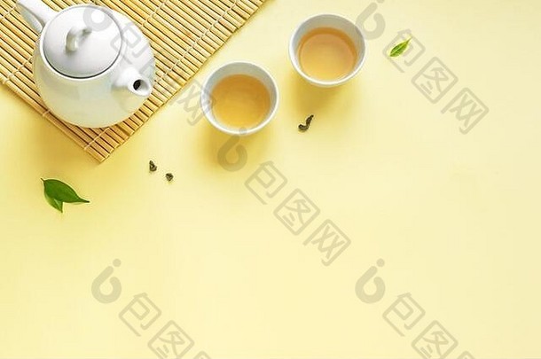 白色杯茶茶壶绿色茶叶子黄色的柔和的背景复制空间茶作文亚洲茶文化有机Herbal