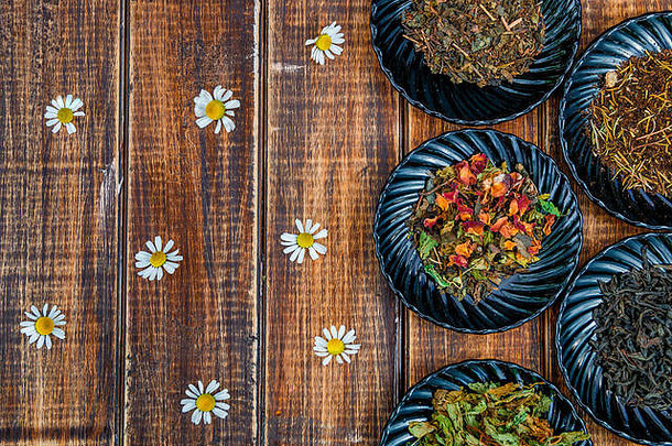 类型茶盘子木背景花洋甘菊分类干茶茶概念茶叶子