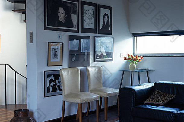 奶油皮革椅子黑色的皮革沙发联排别墅生活房间集团框架黑色的白色照片墙