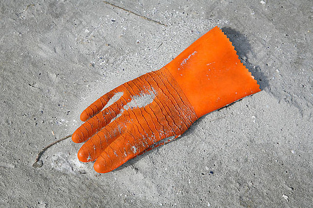 橙色工作手套海滩