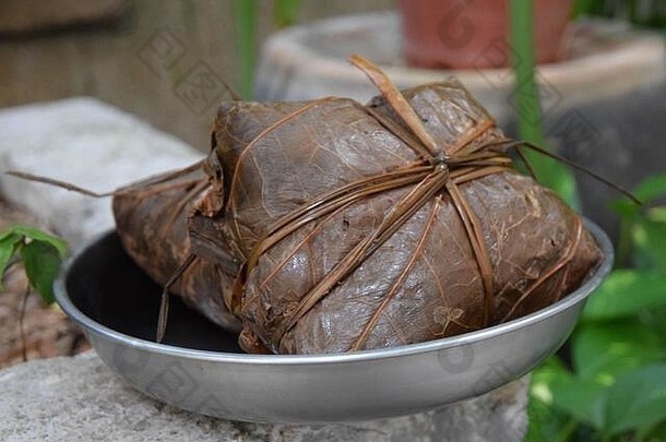粽子传统的中国人大米菜使糯米大米塞馅料包装竹子大平叶子