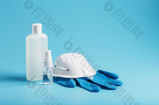 生活反病毒保护蓝色的背景面具橡胶手套瓶手洗手液防腐剂过来这里