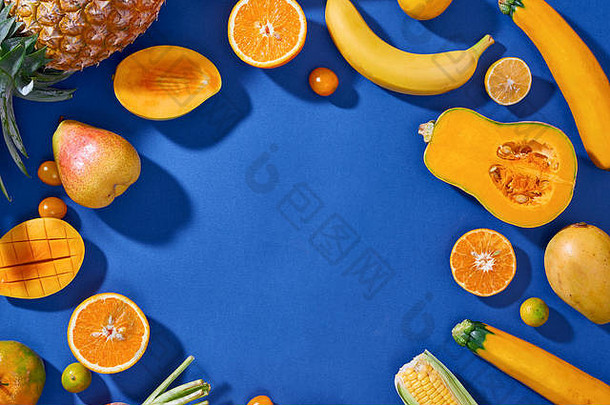 集合新鲜的黄色的<strong>水果</strong>蔬菜蓝色的背景