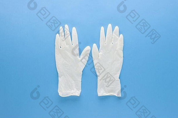 清洁医疗橡胶手套保护手细菌孤立的光蓝色的背景