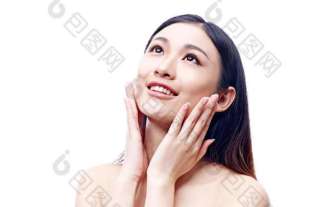 年轻的美丽的亚洲女人清洁新鲜的光滑的皮肤孤立的白色背景