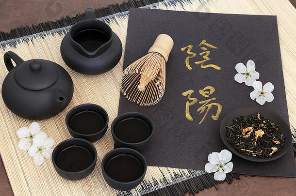 中国人茉莉花茶阴的中国人书法脚本樱桃开花茶壶杯壶搅拌干叶子