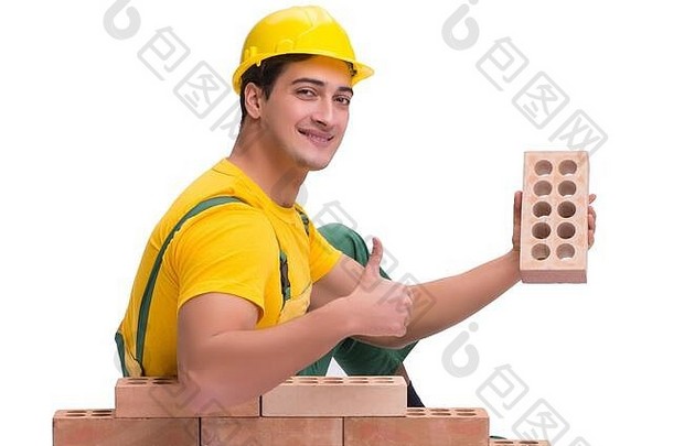 英俊的建设工人建筑砖墙