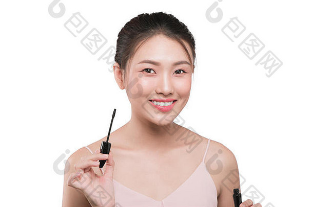 眼睛使应用睫毛膏刷肖像美丽的亚洲女人完美的新鲜的脸皮肤
