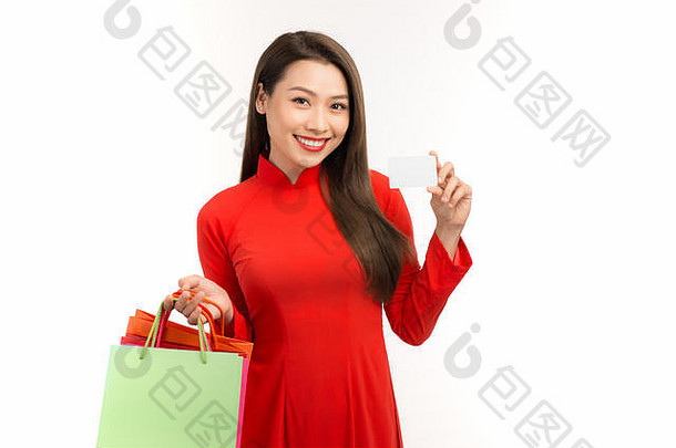 亚洲越南女人戴曼菊传统的红色的衣服持有空白信贷购物<strong>月球</strong>一年节<strong>日</strong>