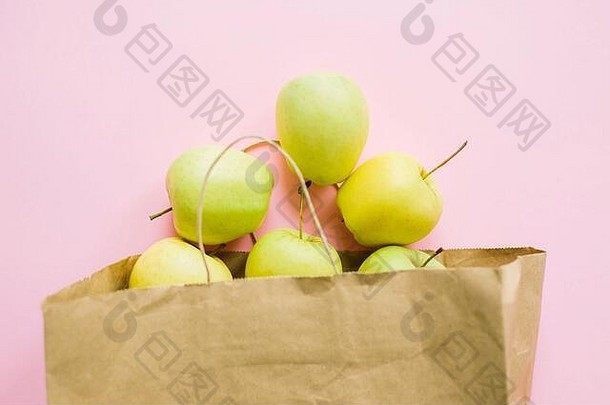 苹果纸袋粉红色的背景平躺浪费购物塑料免费的购物食品杂货在线订单新鲜的有机食物