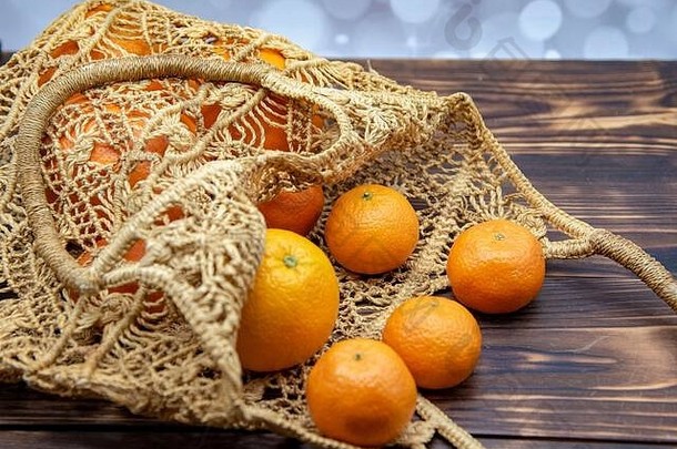 明亮的橙子橘子编织可重用的杂货店袋使环保材料