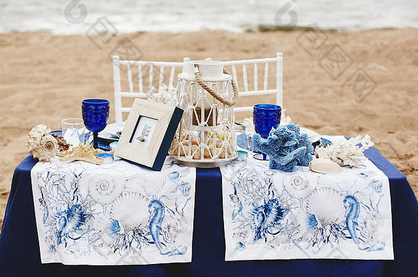 婚礼装饰海洋风格表格新娘新郎桑迪海滩装饰海贝壳珊瑚烛光葡萄酒杯