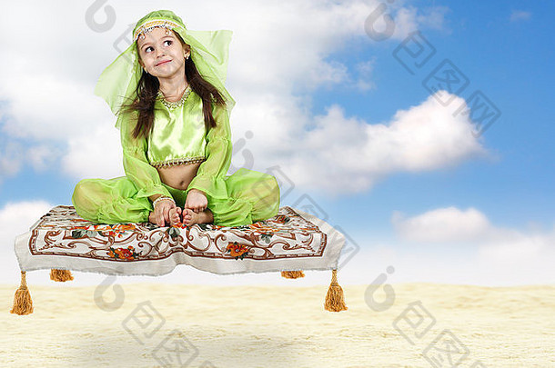 阿拉伯女孩坐着飞行地毯天空背景