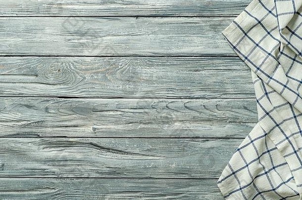 灰色的木表格亚麻厨房毛巾纺织餐巾平躺蓝色的<strong>桌布</strong>灰色的木桌面复制空间文本模拟设计