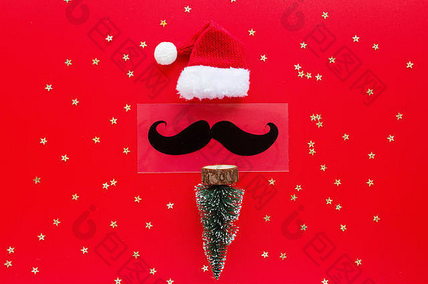 圣诞节树玩具圣诞老人他胡子金五彩纸屑红色的背景一年概念问候卡圣诞节庆祝活动平躺前