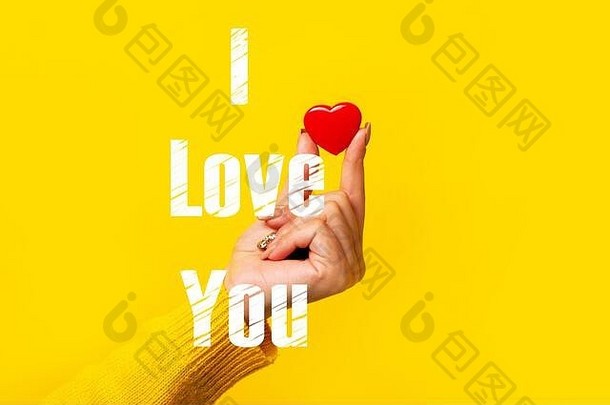 小红色的心手黄色的背景图像登记爱