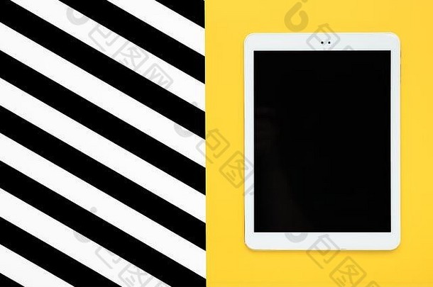 数字平板电脑黑色的触摸屏幕显示黄色的白色黑色的条纹背景平躺前视图模拟有创意的现代作文