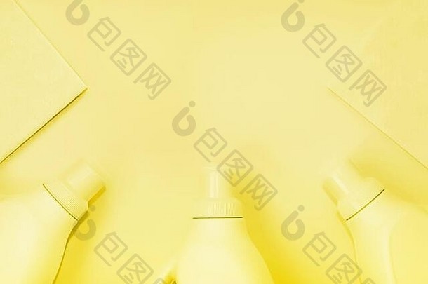 塑料瓶化学物质清洁破布清洁黄色的着色黄色的背景清洁概念