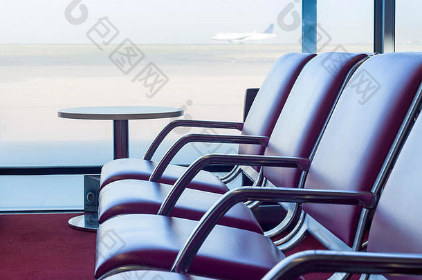 板凳上离开航班等待大厅机场飞机背景