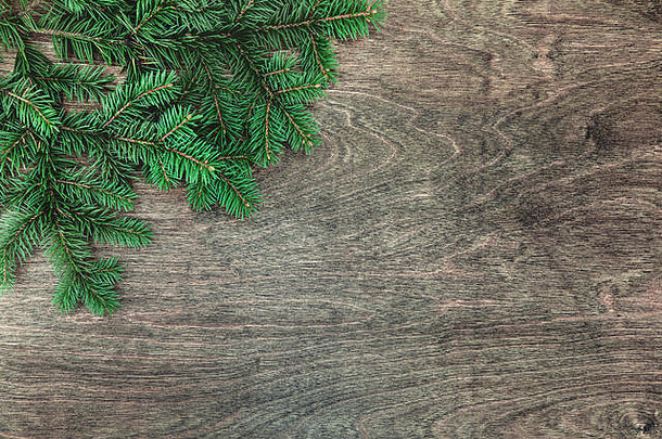 自然圣诞节背景边境毛茸茸的绿色冷杉分支机构变形黑暗棕色（的）木背景复制空间文本平躺前生活