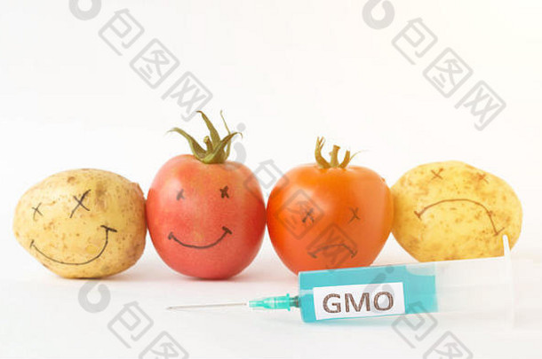 蔬菜白色背景土豆西红柿硝酸盐转基因生物注射器特写镜头基因修改生物