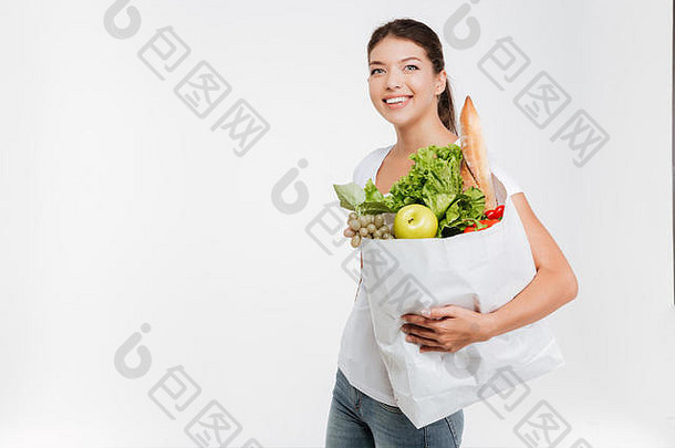 肖像快乐女人持有水果蔬菜孤立的白色背景
