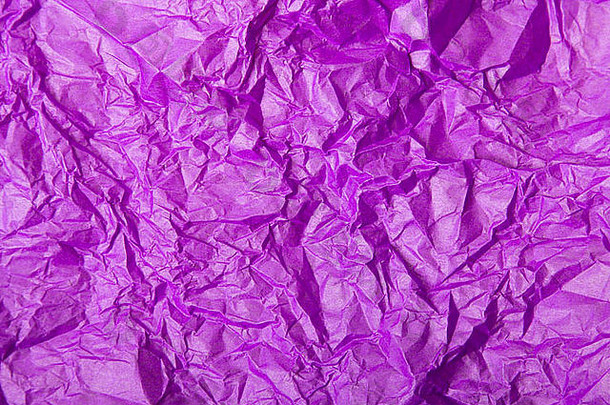 紫罗兰色的皱巴巴的组织纸背景