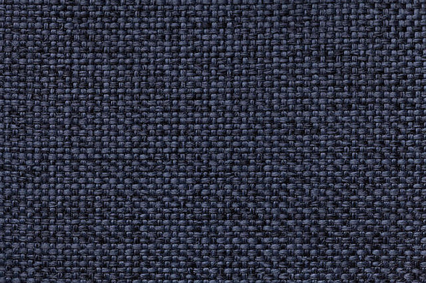 海军蓝色的背景编织网纹模式特写镜头纹理编织织物宏