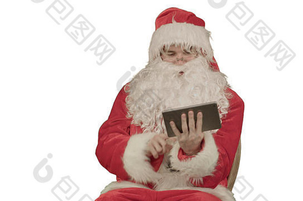 圣诞老人听音乐触碰平板电脑白色背景