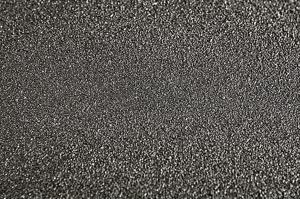 纸粗糙的纹理背景砂纸摘要背景粮食材料黑色的木工特写镜头沙子变形
