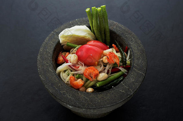 泰国绿色木瓜沙拉喜欢那里著名的斯特里食物泰国花岗岩砂浆黑暗背景