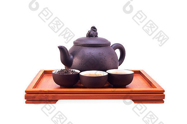 中国人绿色茶粘土能杯竹子木托盘孤立的白色