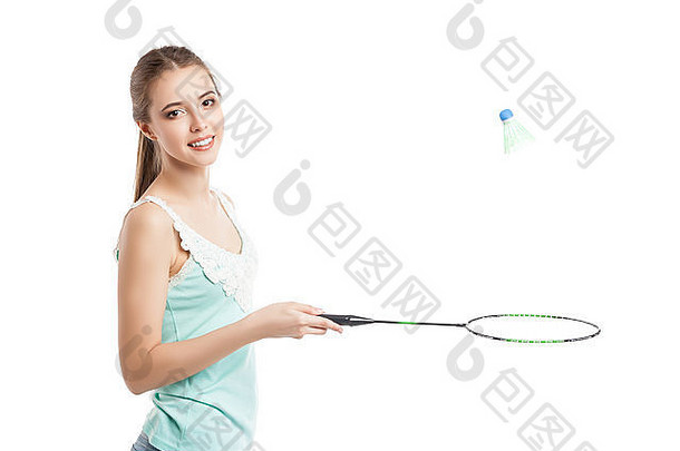 美丽的女孩玩羽毛球球拍