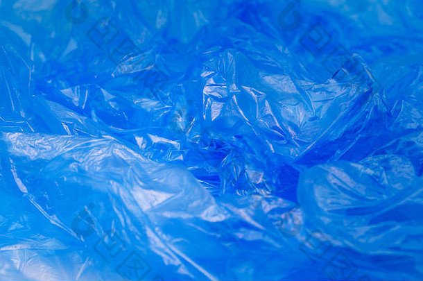 蓝色的塑料袋纹理摘要皱纹背景塑料垃圾