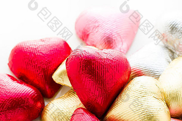 心形状巧克力糖果包装色彩斑斓的箔情人节一天