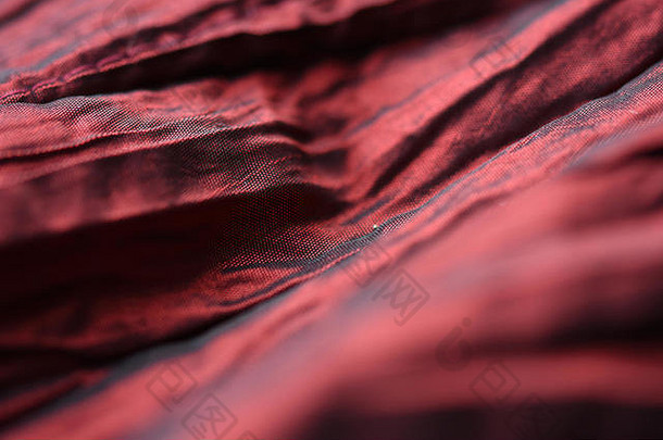 特写镜头高度变形照片深红色的红色的织物