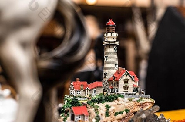 微型小雕像房子灯塔锋利的焦点散景对象概念家庭首页玩具游戏古董房子项目出售车库存储
