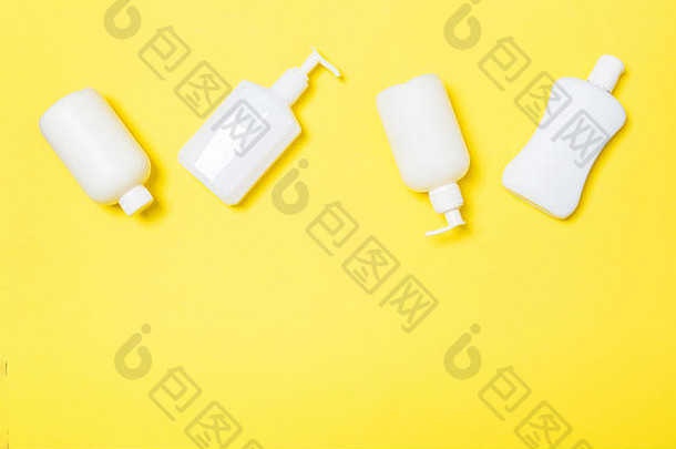 集白色化妆品容器孤立的黄色的背景前视图复制空间集团塑料身体护理瓶容器空空间