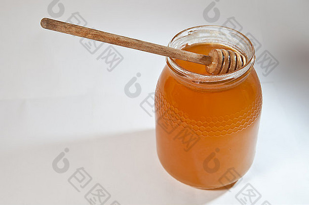 美味的alcarria西班牙语蜂蜜蜂蜜坚持孤立的白色背景