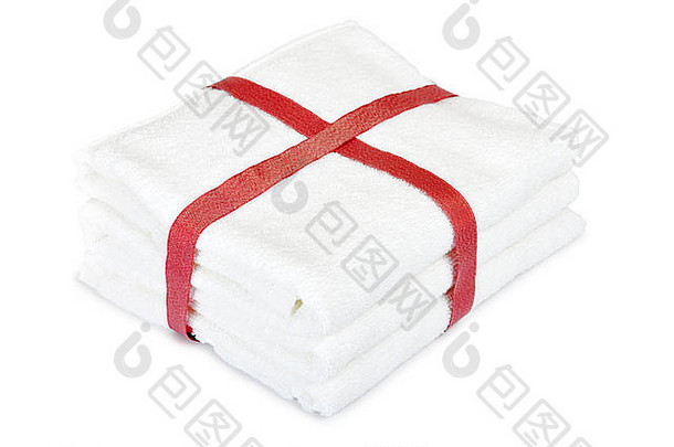 白色毛巾堆栈红色的丝带白色背景