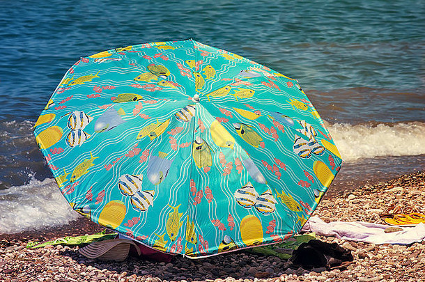 海滩水阳伞保护太阳毛巾服装