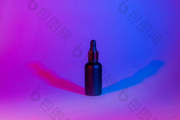 瓶黑色的不光滑的颜色霓虹灯趋势背景化妆品概念最低